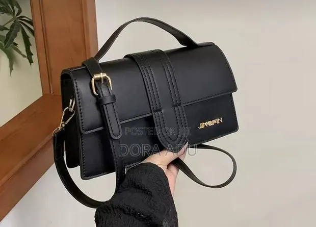 Elegant Top-Handle Crossbody Bag · Photo 1