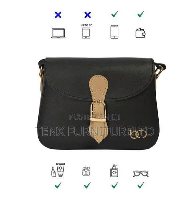Ladies Black Handbag ( Closure Strap) · Photo 1