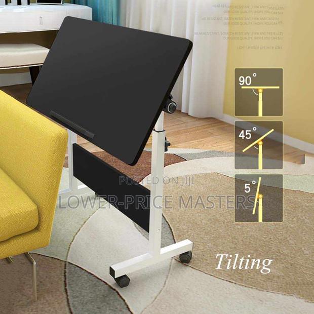 Adjustable and X360 Rotatory Table · Photo 1