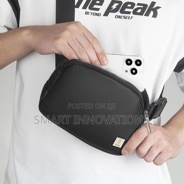 Leather Crossbody Bag · Photo 1