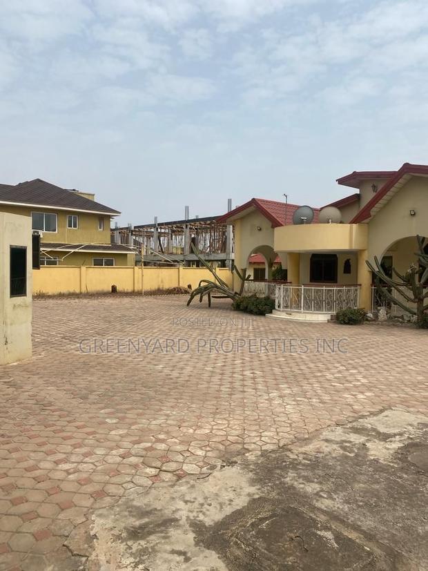 Roadside 2 Plots With Old House at East Legon Adjiriganor · Photo 5