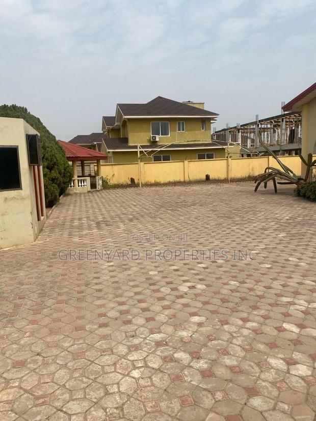 Roadside 2 Plots With Old House at East Legon Adjiriganor · Photo 4