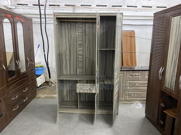 Three Doors Wardrobe With A Mirror 8153 · Photo 2