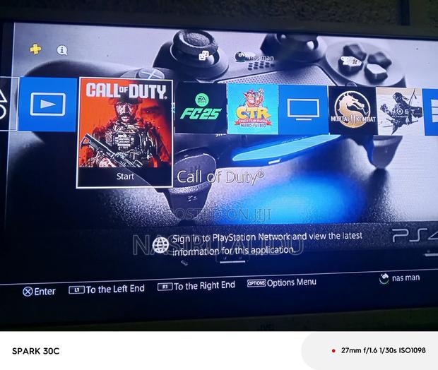 Ps4 Slim With Fc26 7 Games · Photo 8