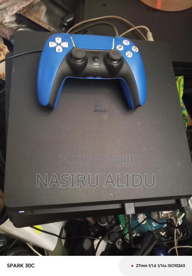 Ps4 Slim With Fc26 7 Games · Photo 7
