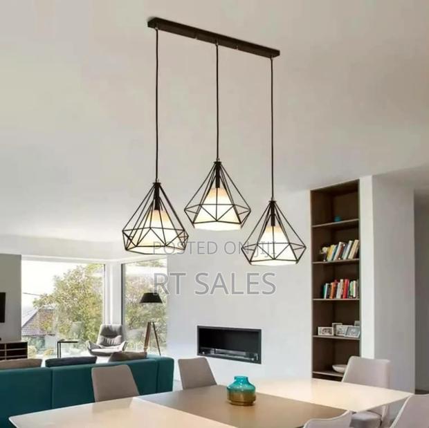 Long and Round Base Pendant Light. · Photo 1
