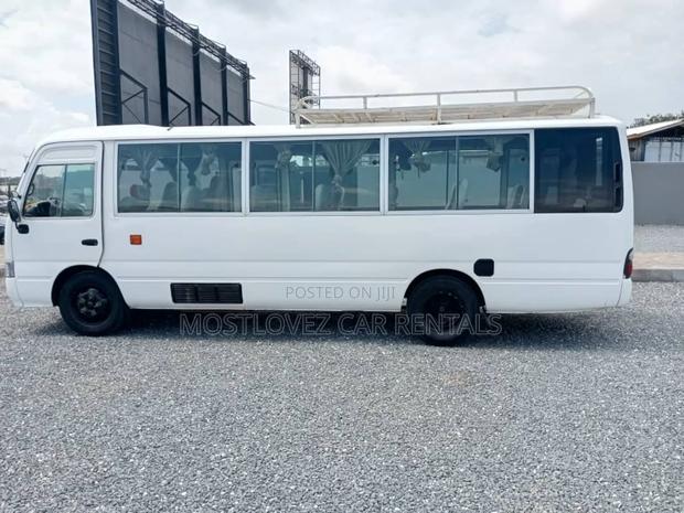 Car Rentals- 28-30 Seaters Coaster Bus for Rent · Photo 1