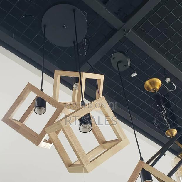 Brown Wooden 3 in 1 Pendant Light. · Photo 1