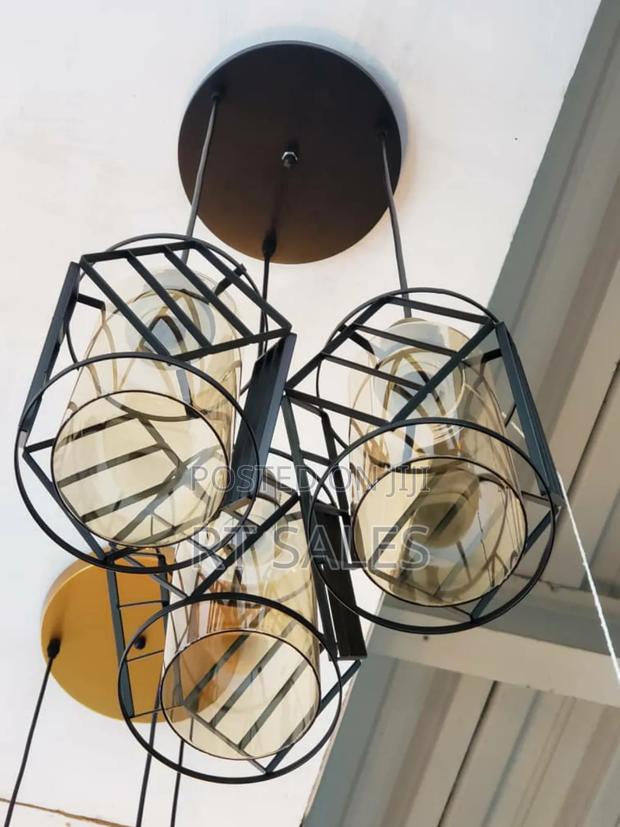 Metal and Glass 3 in 1 Pendant Light. · Photo 1