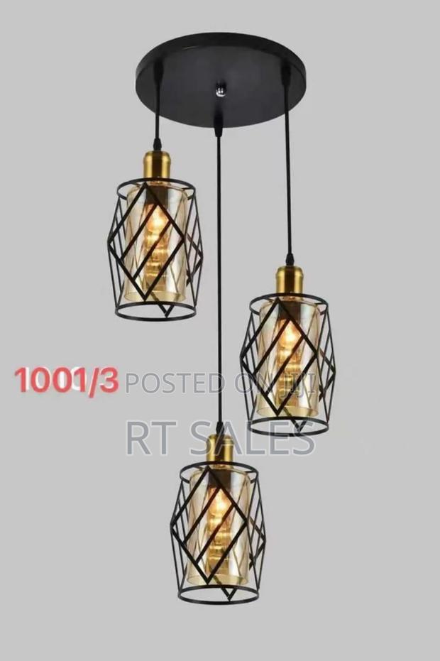 Metal and Glass 3 in 1 Pendant Light. · Photo 3