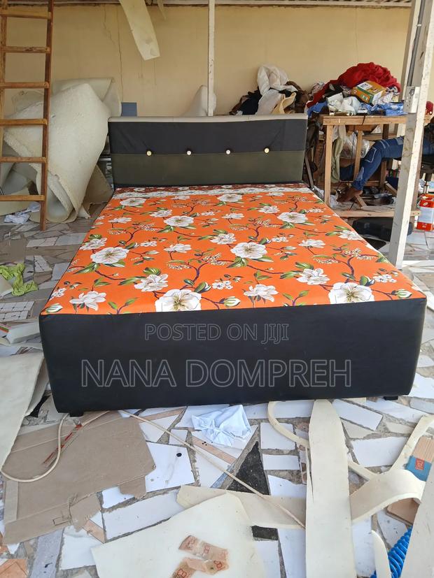 Orange on Black Bed · Photo 1