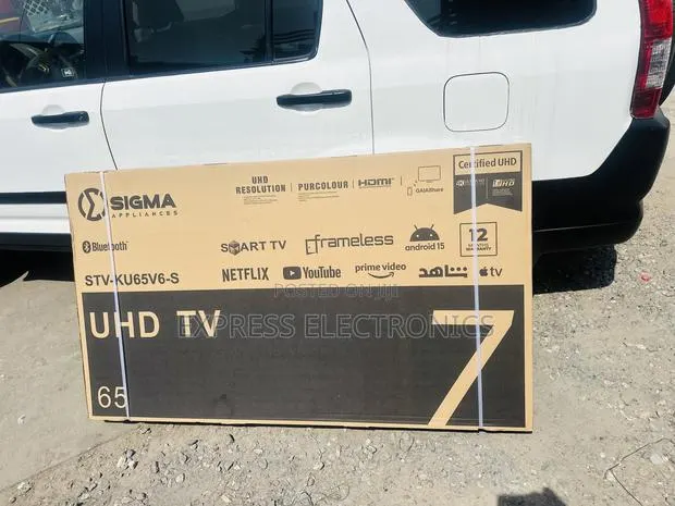 Available Now at Store Uhd Android 15 Smart Sigma 65” · Photo 1