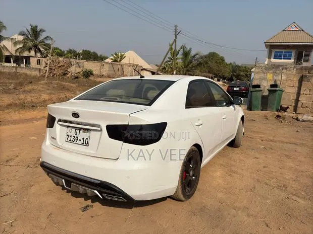 Kia Cerato 1.6 LX 2009 White · Photo 1