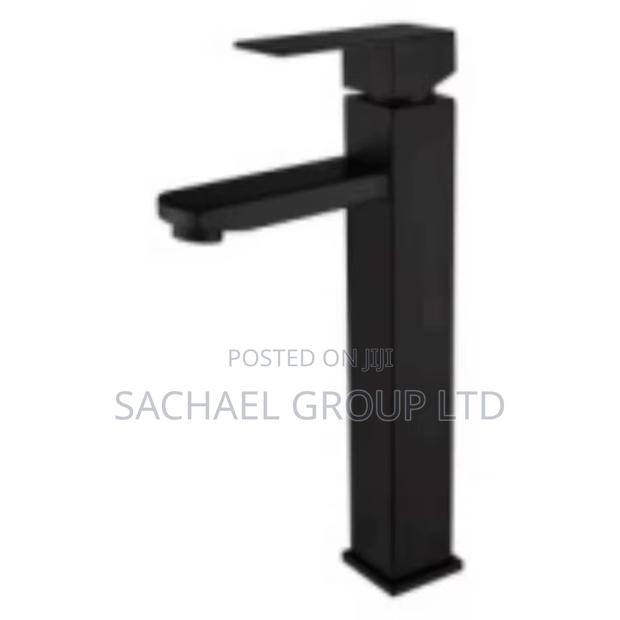 Basin Long Taps Hot Cold · Photo 1