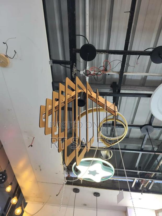 Single Wooden Triangle Ceiling Pendant Light · Photo 3