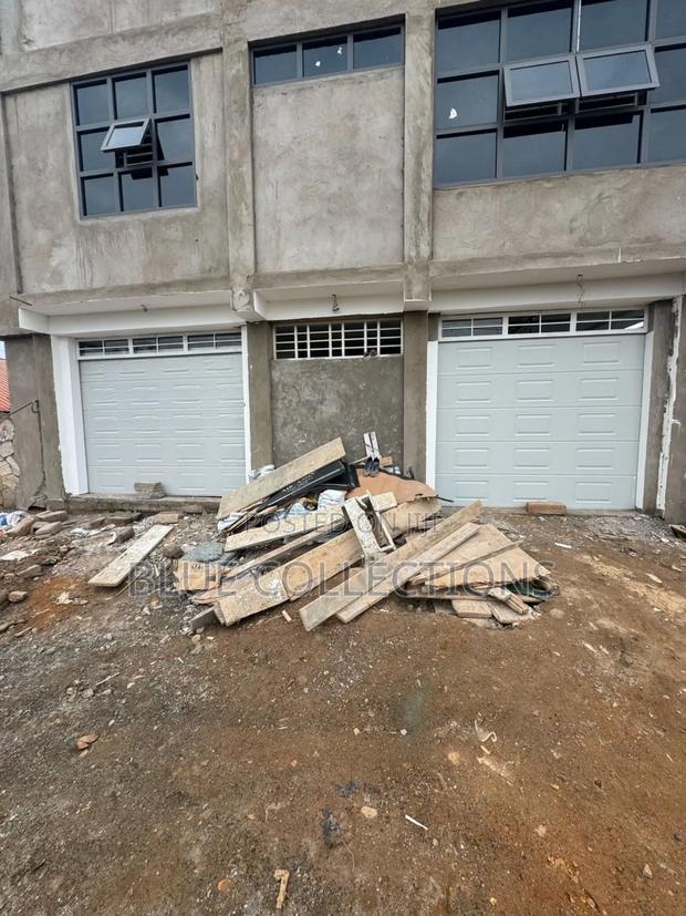 Garage Doors With Motor · Photo 1
