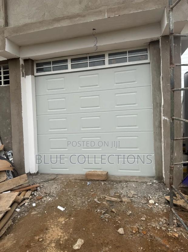Double Garage Doors · Photo 1