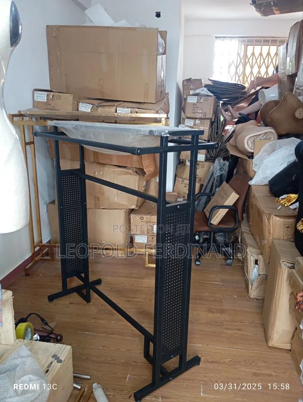 Adjustable Black Clothing Rack · Photo 3
