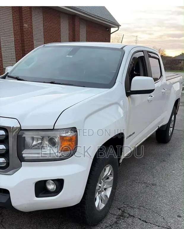 GMC Canyon SLT 4dr Crew Cab SB (2.5L 4cyl 6A) 2015 White · Photo 1