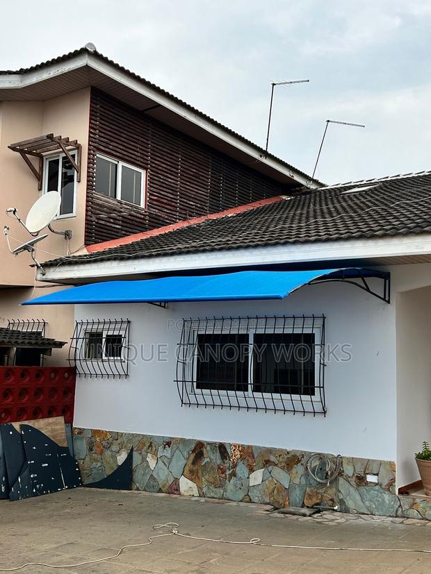 Shade Canopy for Sun and Rain · Photo 1
