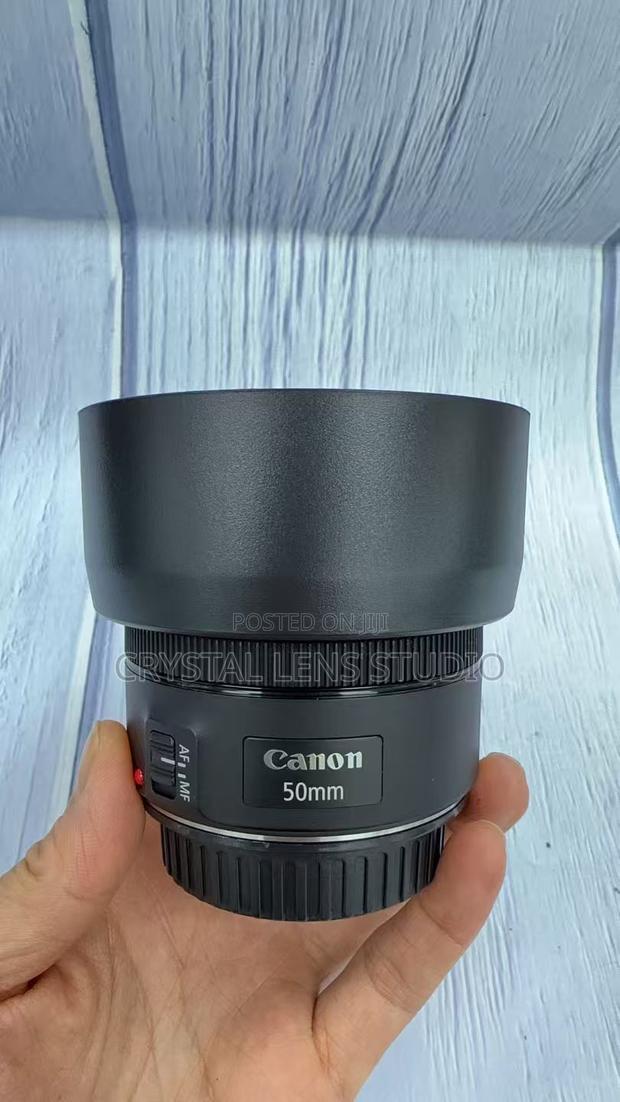 99% New Canon 50mm F1.8 STM With Lens Hood · Photo 1