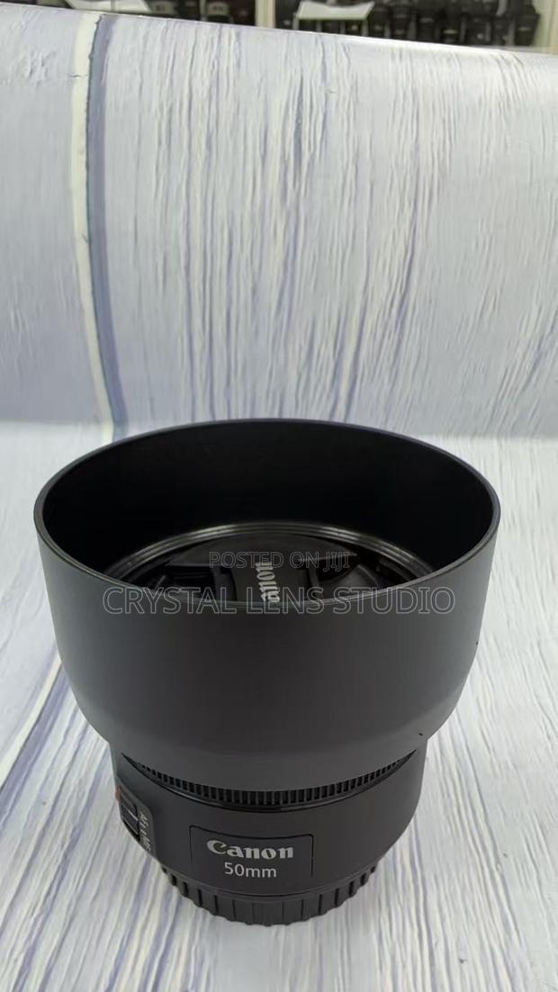 99% New Canon 50mm F1.8 STM With Lens Hood · Photo 4