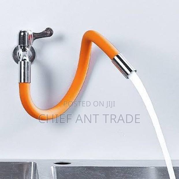 Tap Extension / Faucet Extension. Orange Tube · Photo 1