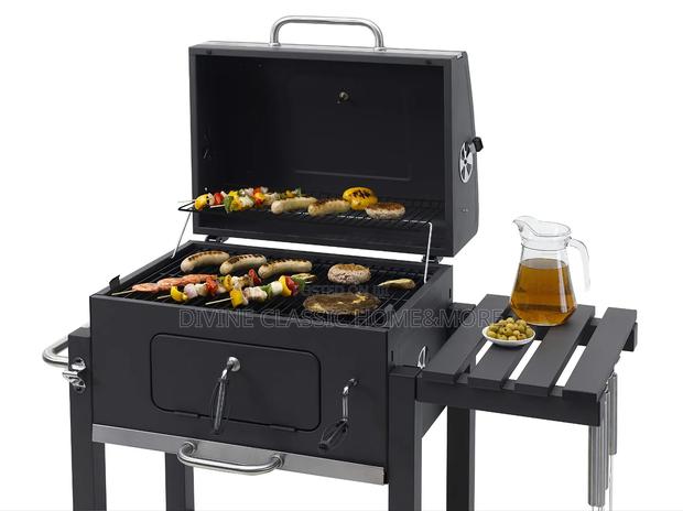 Dkiei Barbecue Grill, Portable Charcoal BBQ Grill With Wheel · Photo 6