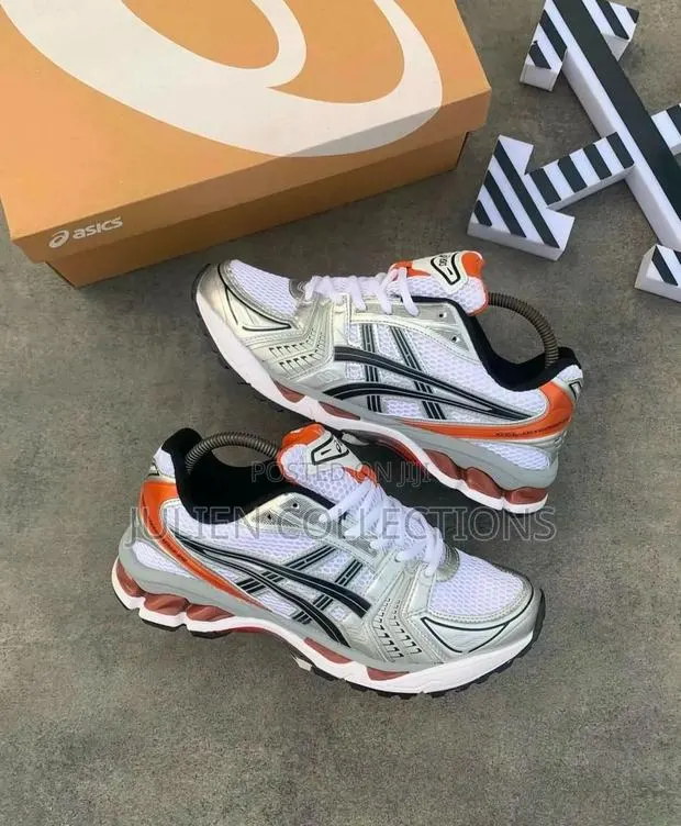 Asics Gel Kayano Orange and Gruy · Photo 1