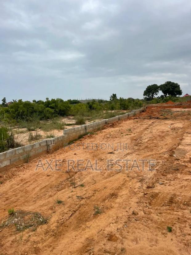 Neat Spacious Titled Plots at Tema Community 25 · Photo 1