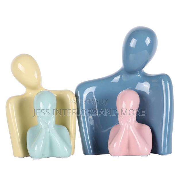 Ceramic Family of Four Sculpture · Photo 2