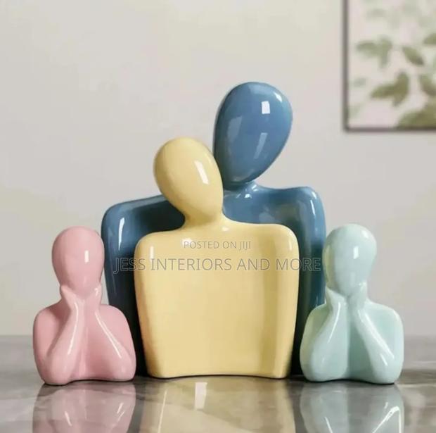 Ceramic Family of Four Sculpture · Photo 1