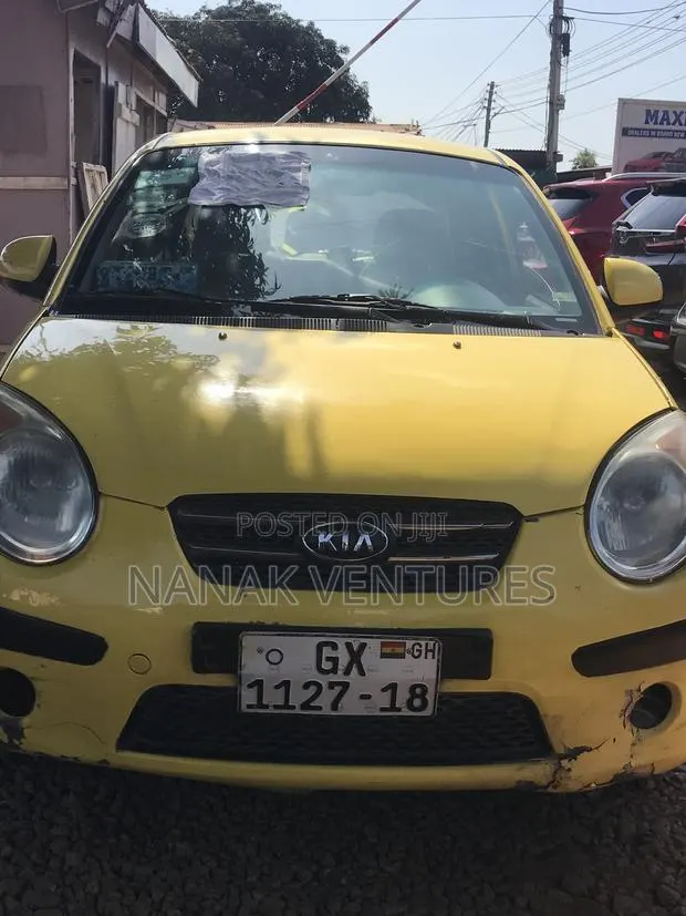 Kia Morning 2009 Yellow · Photo 1