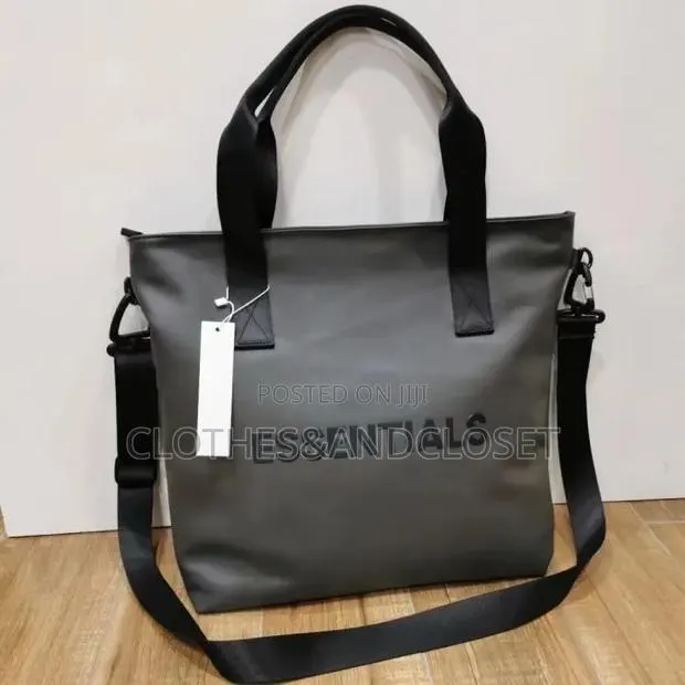 Fear of God Essentials Tote Bag Features a Matte-Coated · Photo 1