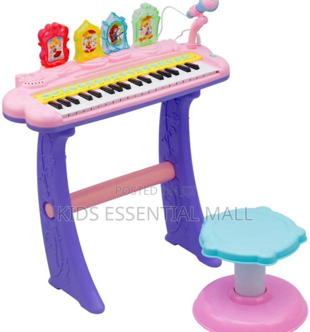 Keyboard or Piano With Stand and Chair · Photo 3