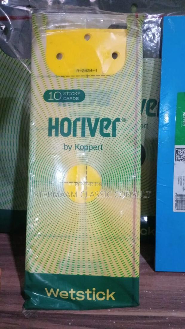 Insect Sticty Traps and Tomato Setting Hormones · Photo 1