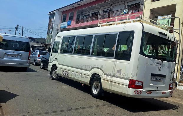 Rent a Car - Toyota Coaster 28 Seat for Rent in Ghana · Photo 2
