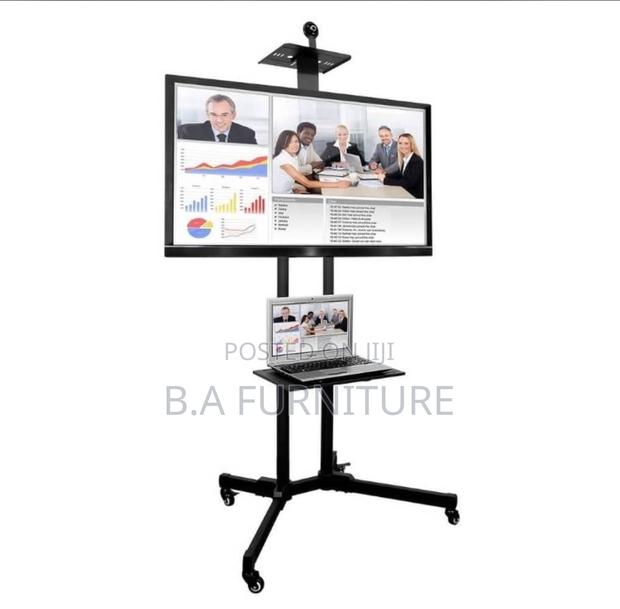Adjustable Tv and Laptop Stand With Wheel · Photo 1