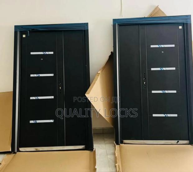 Quality Exterior Black Metallic Doors · Photo 1