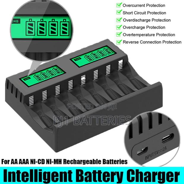 8 Slot Battery Charger Aa Aaa Ni-Cd Ni-Mh Batteries · Photo 1