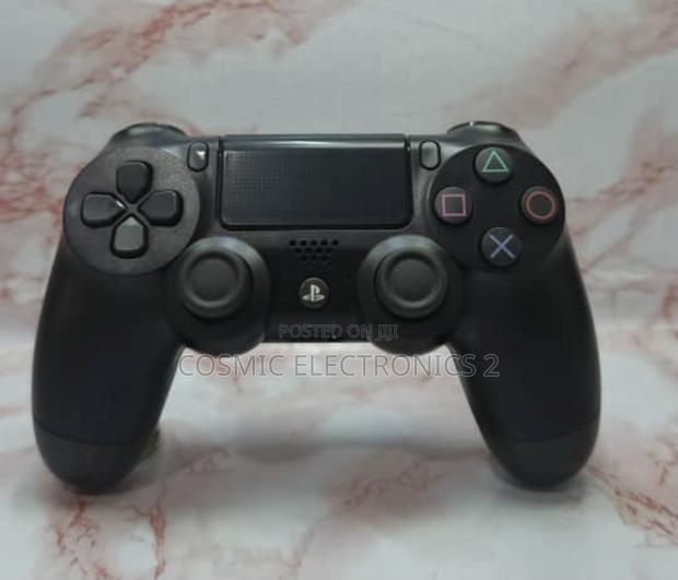 DualShock 4 Wireless Game Controller for PS4 and PC · Photo 1