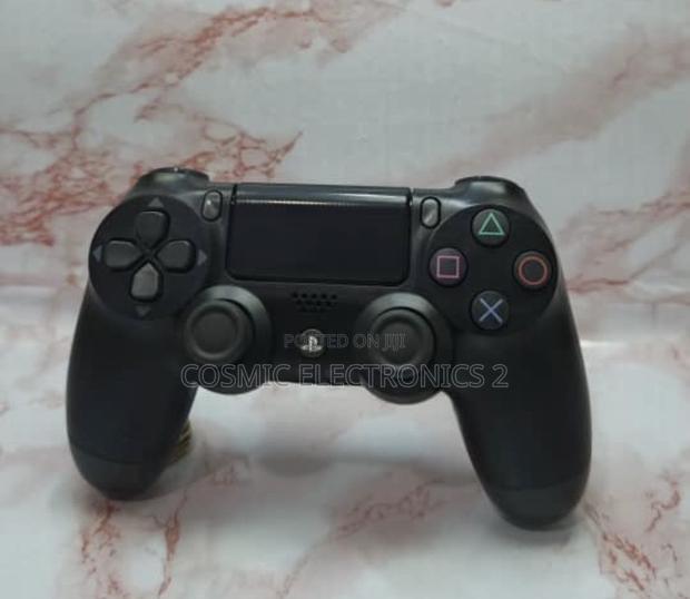 DualShock 4 Wireless Game Controller for PS4 and PC · Photo 3