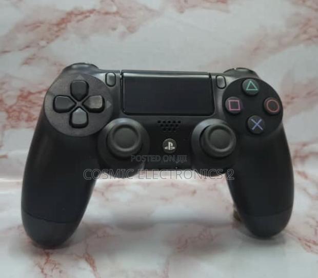 DualShock 4 Wireless Game Controller for PS4 and PC · Photo 2