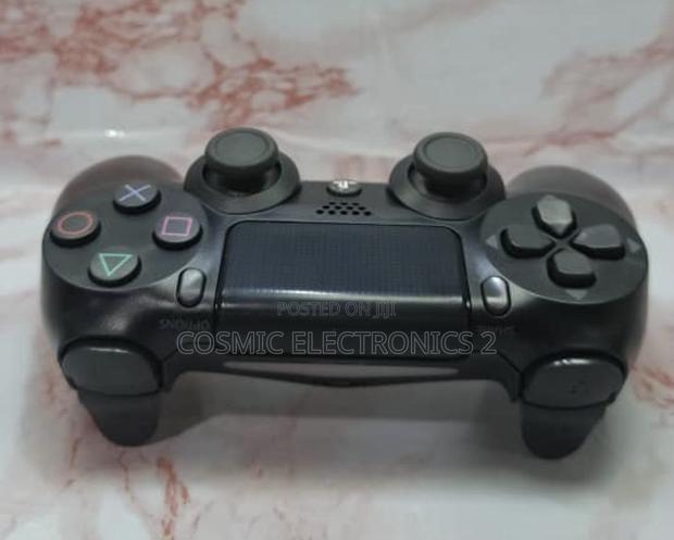 DualShock 4 Wireless Game Controller for PS4 and PC · Photo 7