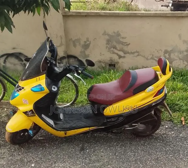 SYM Fnx 125 1999 Yellow · Photo 1