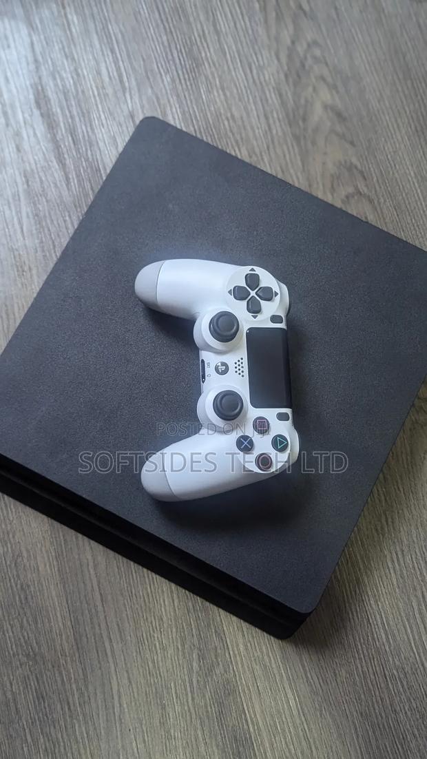 Ps4 Slim Black Jailbreaked Console With Games at Good Price · Photo 3