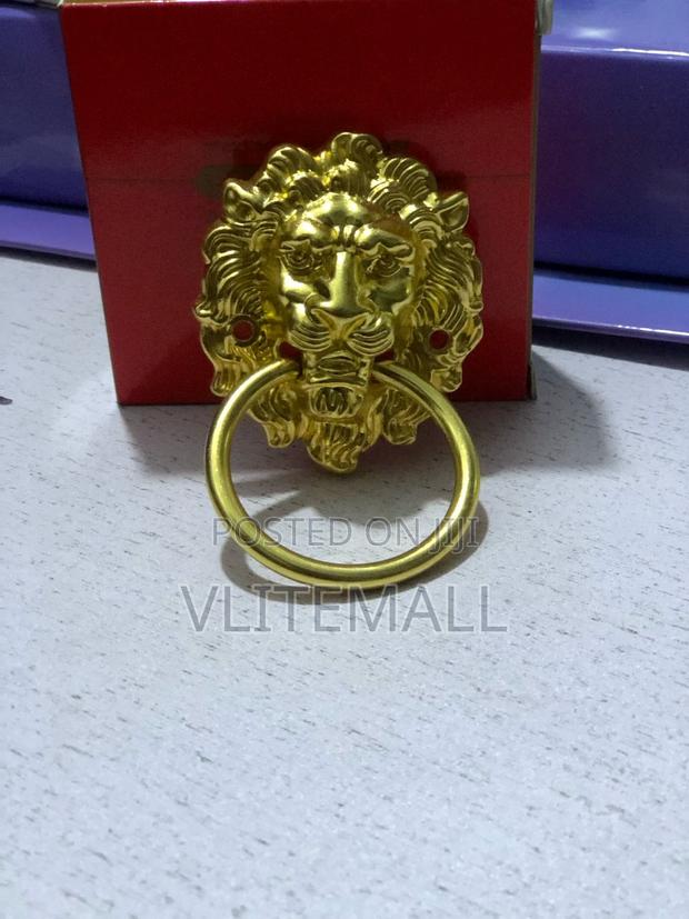 Lions Head Door Knocker, Solid Gold, Hand Polished · Photo 1