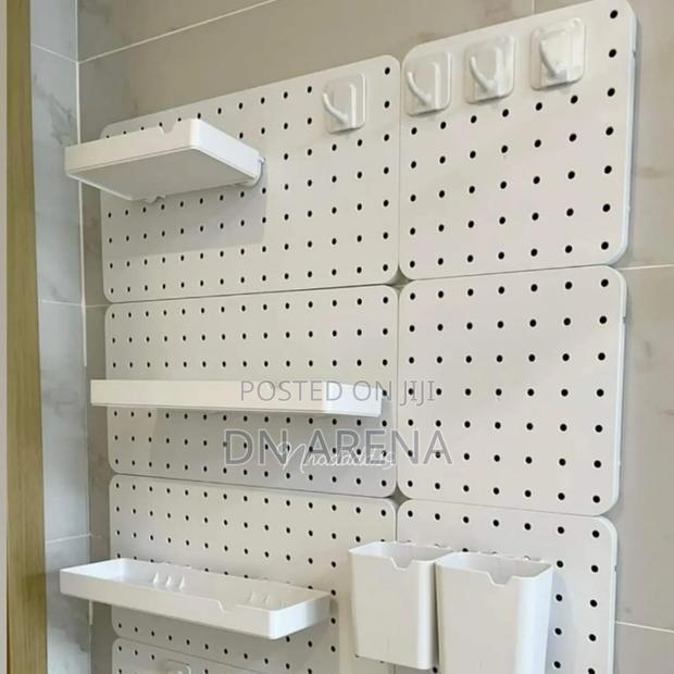 White and Black Plastic Peg Board Perforated Board · Photo 2
