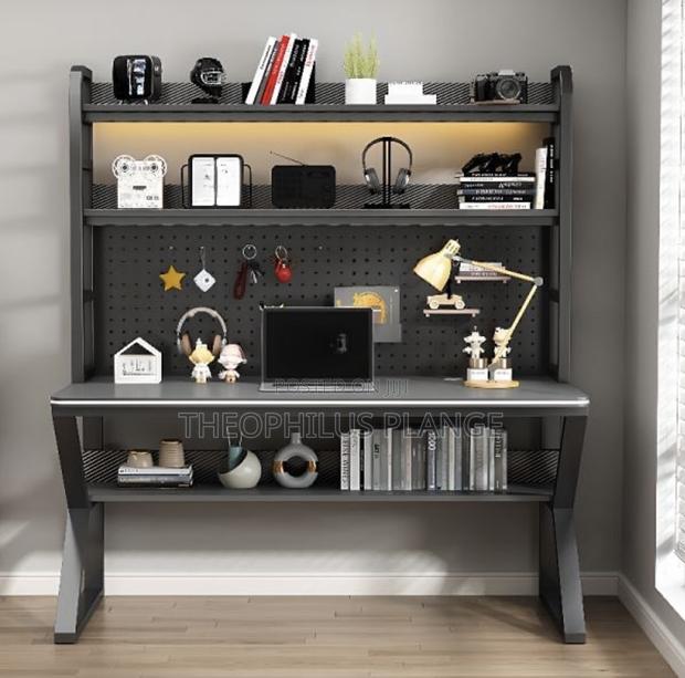 Double Decker Study Table With 2 Shelves and Pegboard. · Photo 2