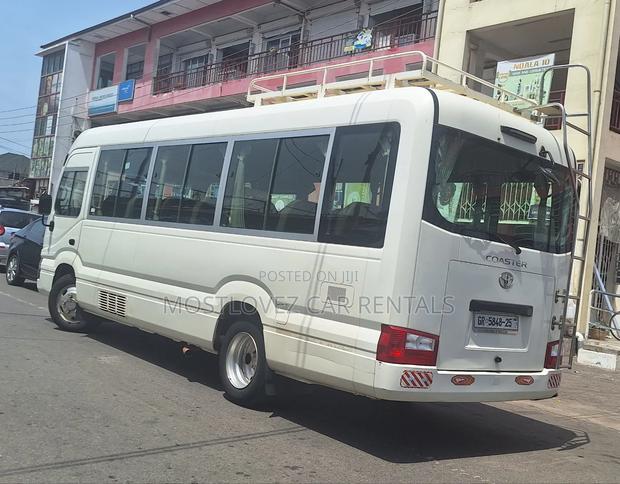 Car Rentals Rent a Toyota Coaster Buses for Your Travels · Photo 4